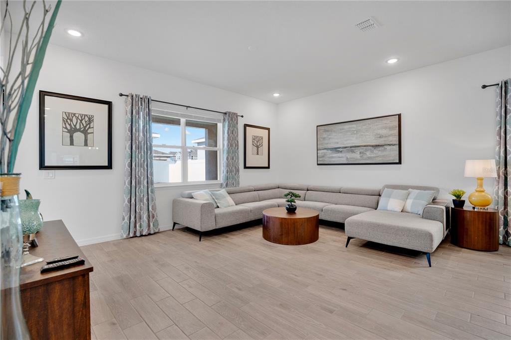 731 FIREROCK Lane DeBary, FL 32713 - Photo 9 of 39 a living room with furniture and a window