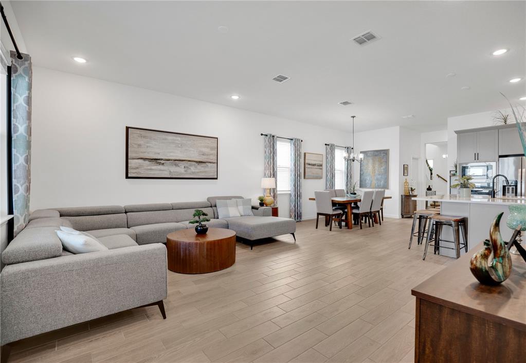 731 FIREROCK Lane DeBary, FL 32713 - Photo 10 of 39 a living room with furniture and a large window