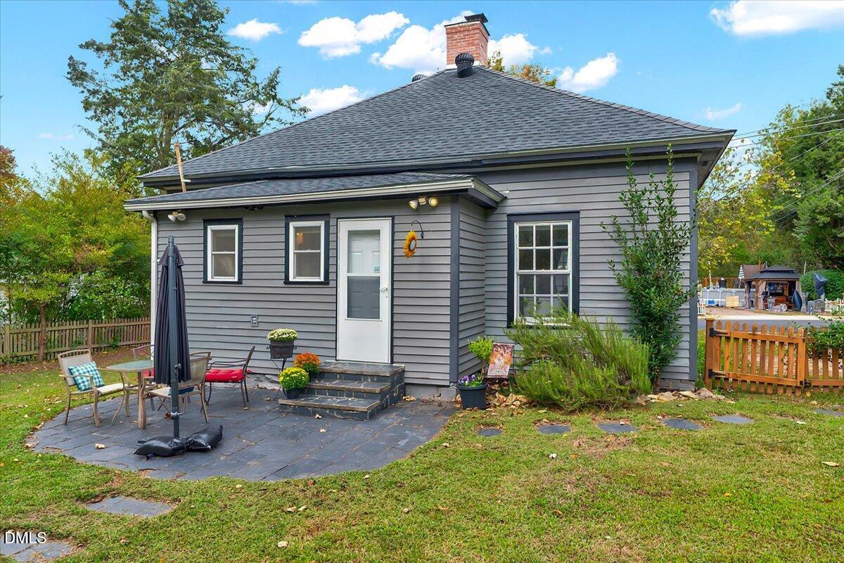 230 Brick Street Wake Forest, NC 27587 - Photo 22 of 38 a view of a house with backyard