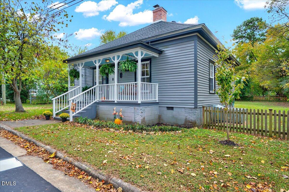 230 Brick Street Wake Forest, NC 27587 - Photo 25 of 38 a front view of a house with garden