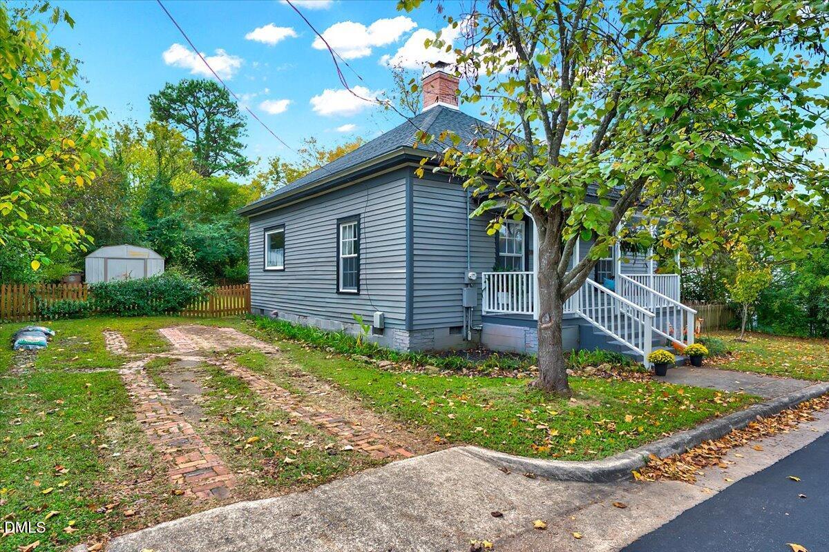 230 Brick Street Wake Forest, NC 27587 - Photo 27 of 38 a front view of a house with a yard