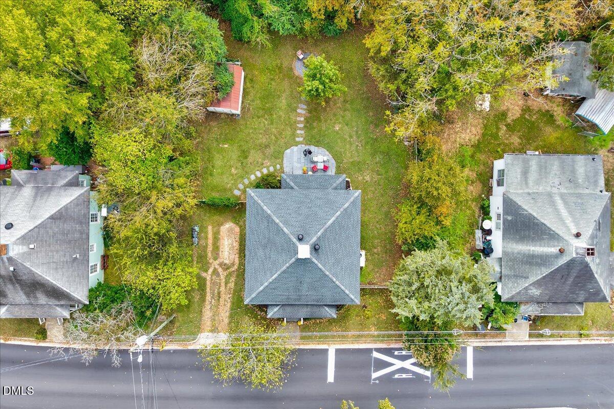 230 Brick Street Wake Forest, NC 27587 - Photo 30 of 38 an aerial view of a house with a yard basket ball court and outdoor seating