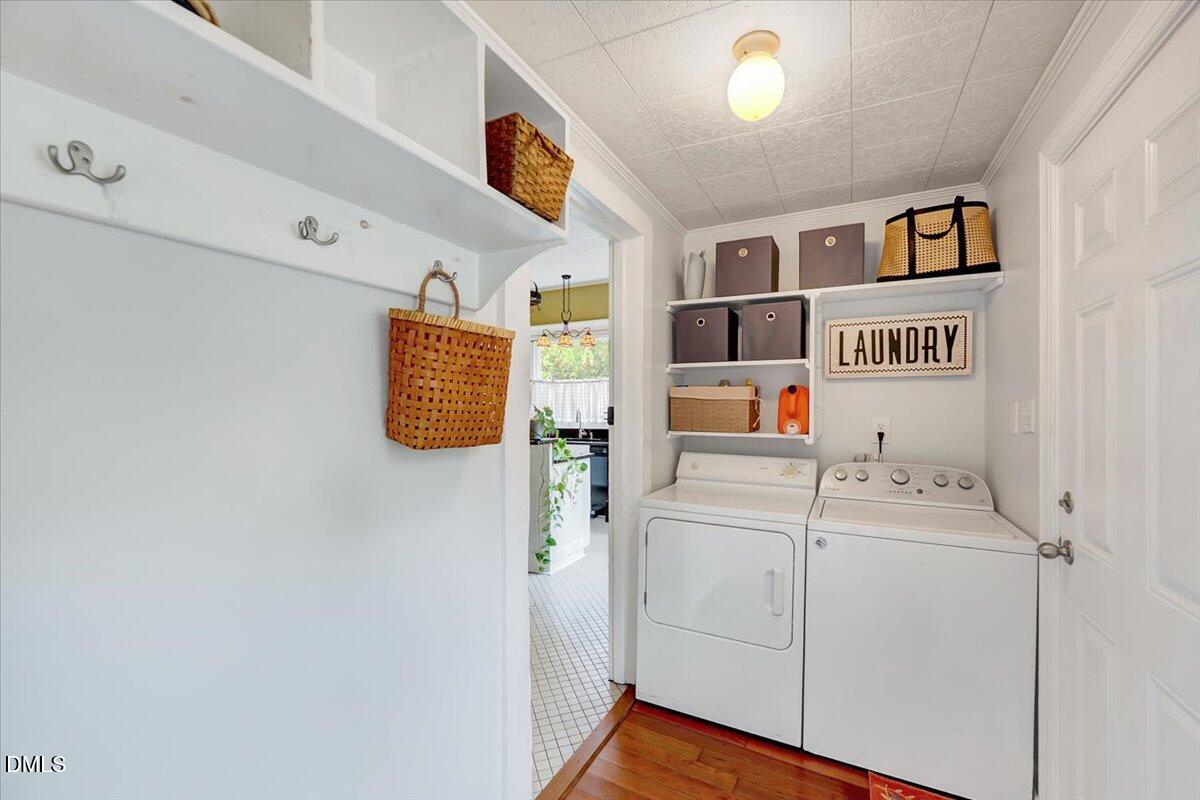 230 Brick Street Wake Forest, NC 27587 - Photo 5 of 38 a utility room with dryer and washer