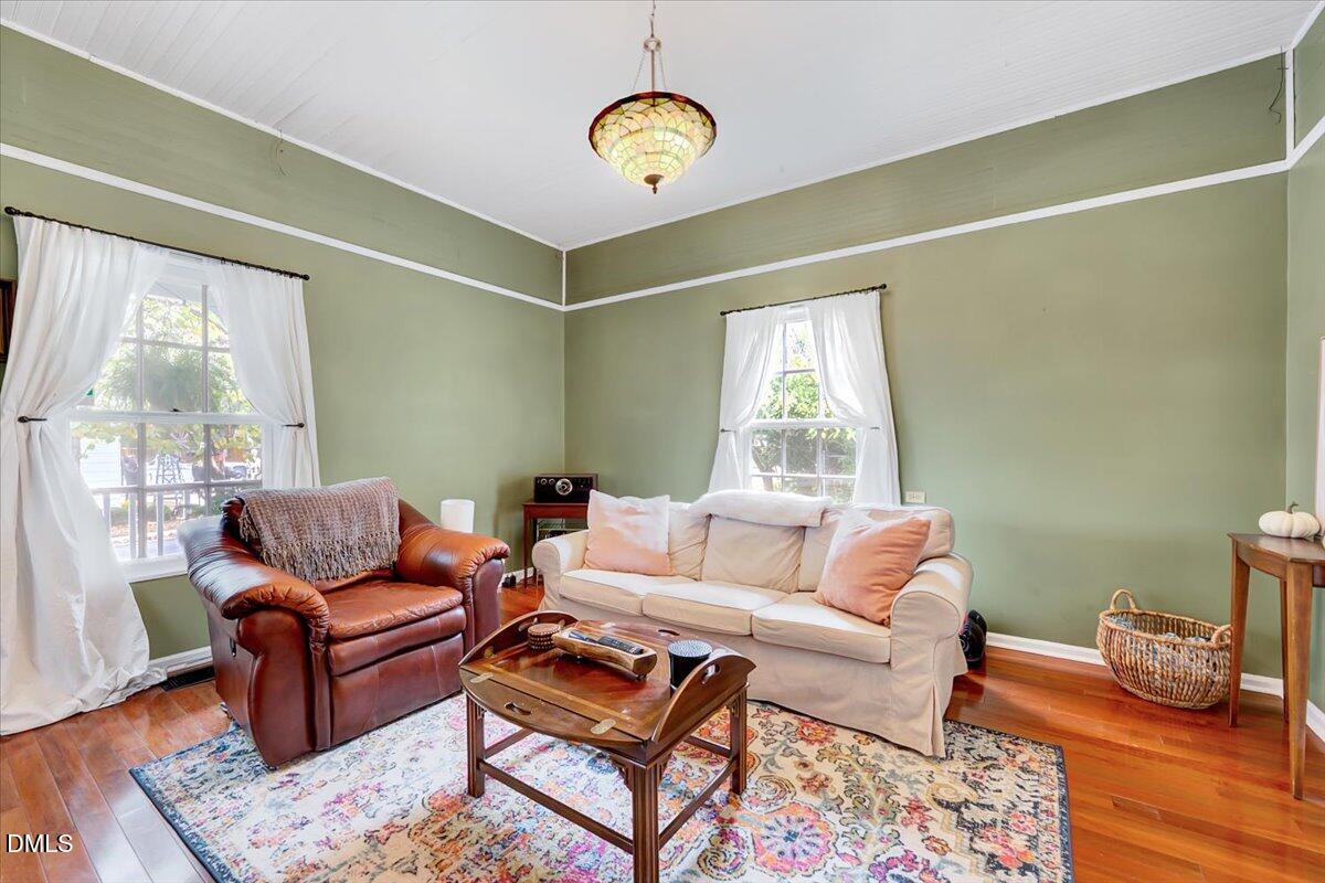 230 Brick Street Wake Forest, NC 27587 - Photo 7 of 38 a living room with furniture and wooden floor