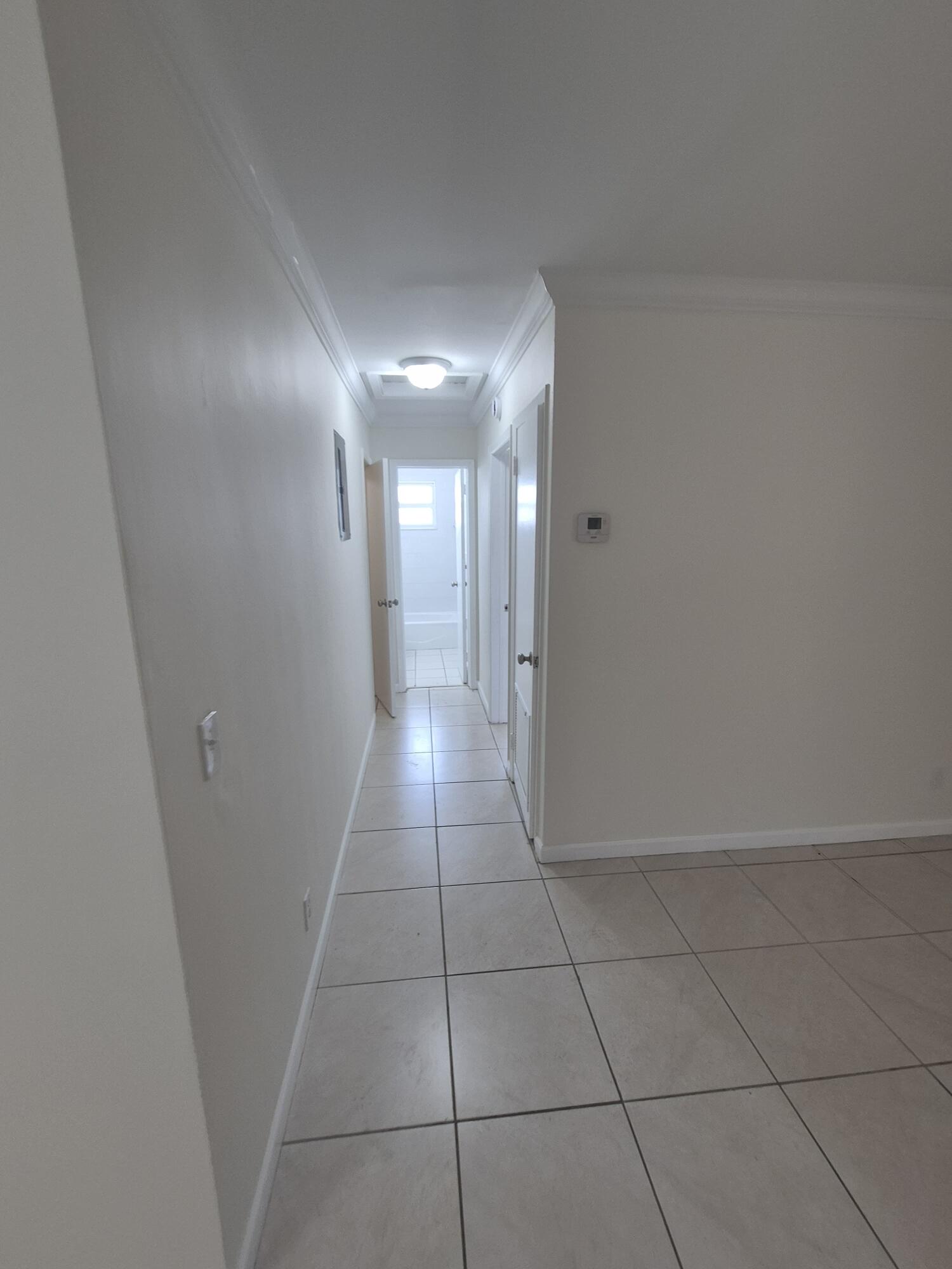 3518 Taylor Street, Unit 4 Hollywood, FL 33021 - Photo 9 of 13 a view of a hallway