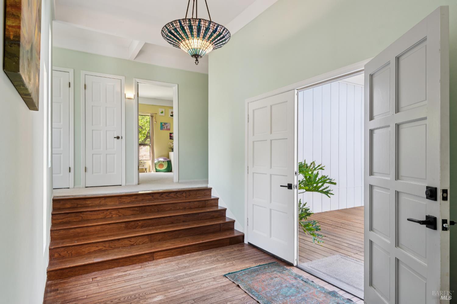 1475 Los Olivos Road Santa Rosa, CA 95404 - Photo 8 of 51 a view of entryway with chandelier and wooden floor