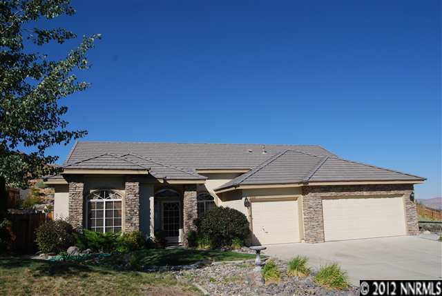 1081 University Ridge Drive Reno, NV 89512 - Photo 1 of 1 a front view of a house with garden