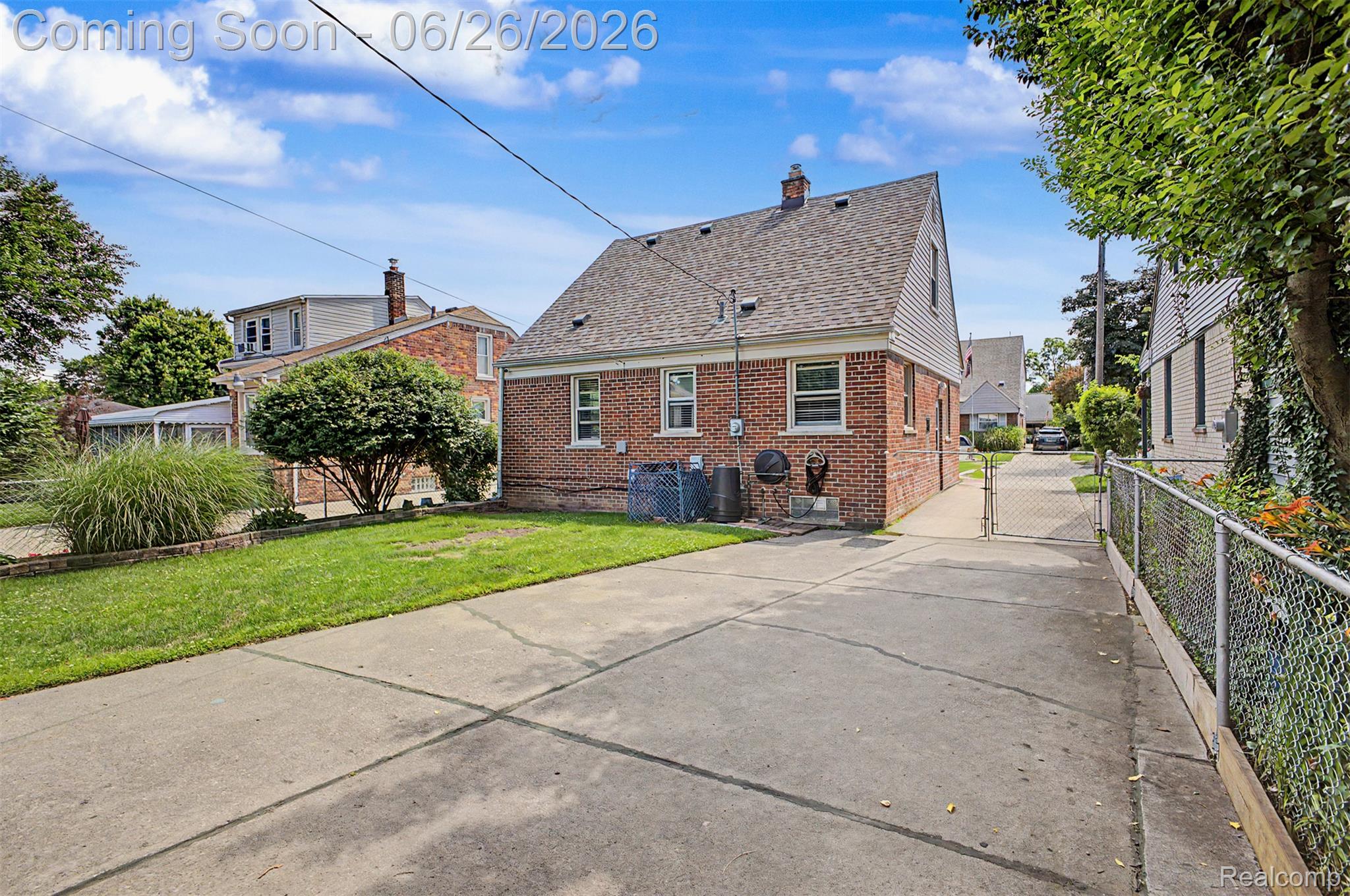 2216 Banner Street Dearborn, MI 48124 - Photo 34 of 34 Brick exterior home featuring a gabled roof and a concrete driveway