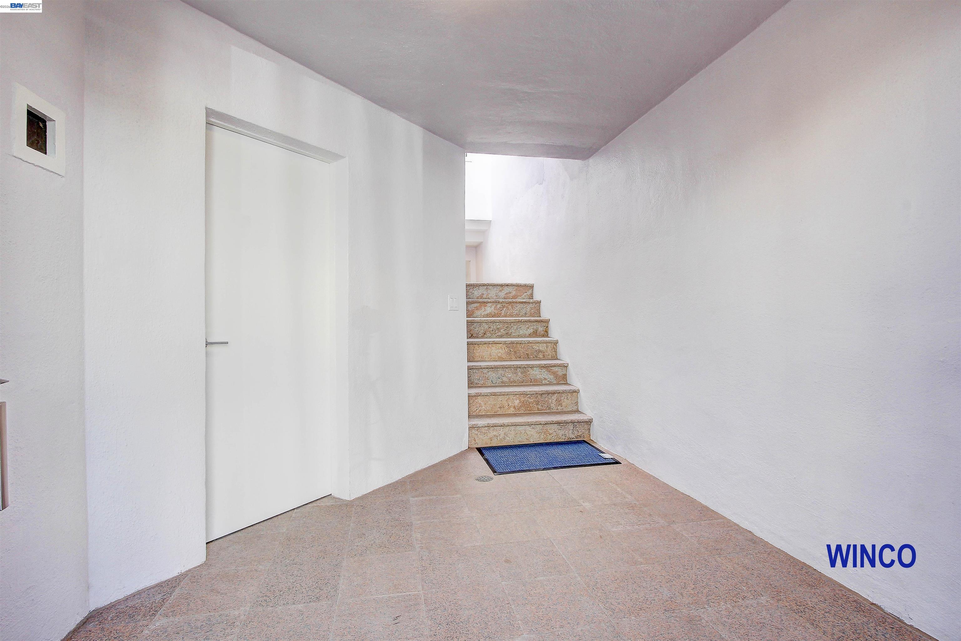 263 Ralston Street San Francisco, CA 94132 - Photo 15 of 28 a view of a hallway with stairs