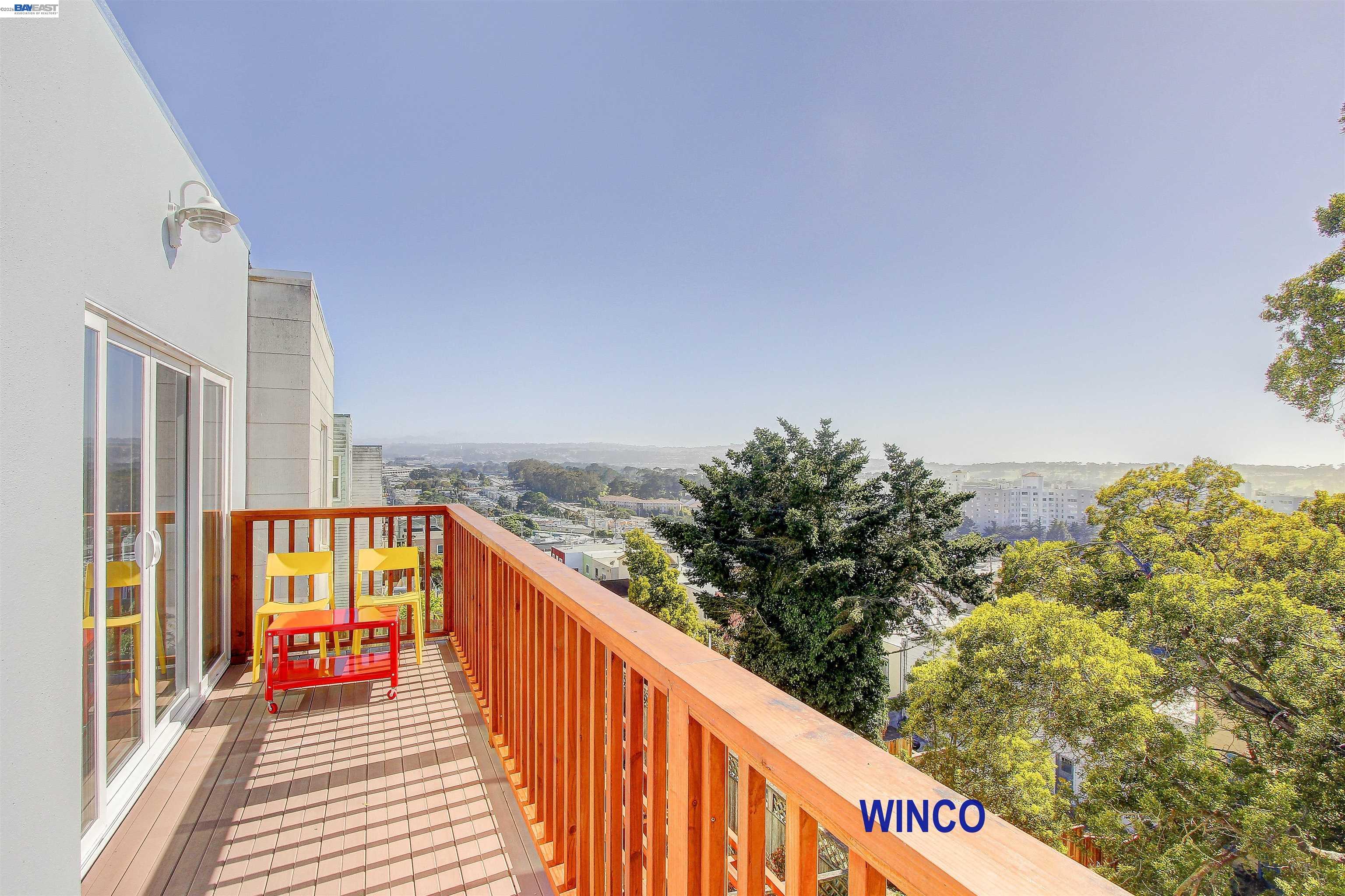 263 Ralston Street San Francisco, CA 94132 - Photo 2 of 28 a balcony with an outdoor seating