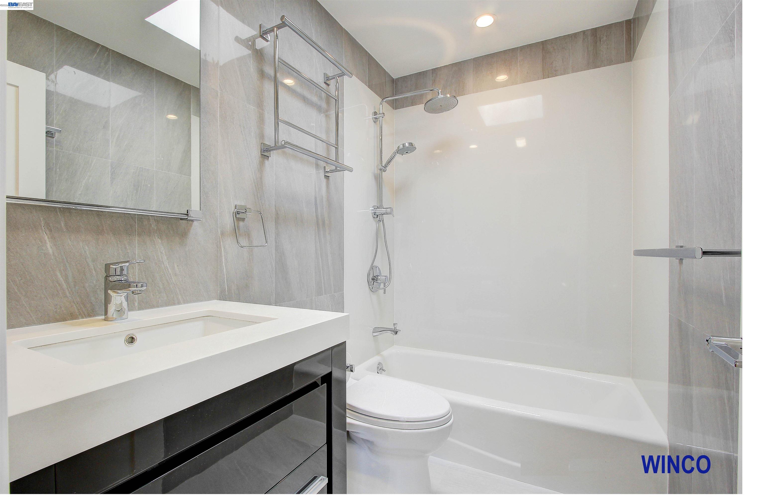 263 Ralston Street San Francisco, CA 94132 - Photo 9 of 28 a bathroom with a sink a toilet and shower