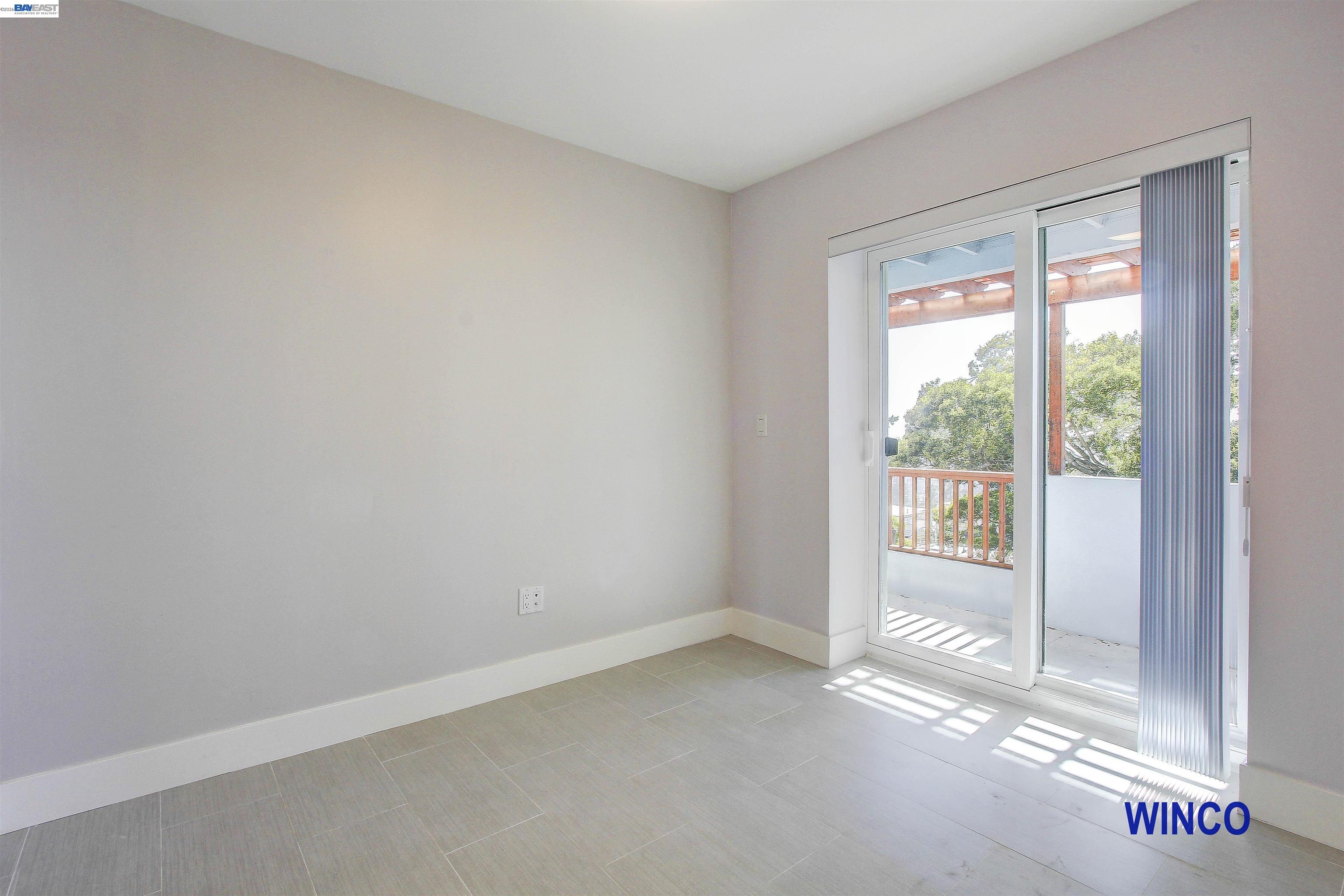 263 Ralston Street San Francisco, CA 94132 - Photo 10 of 28 a view of an empty room with a window