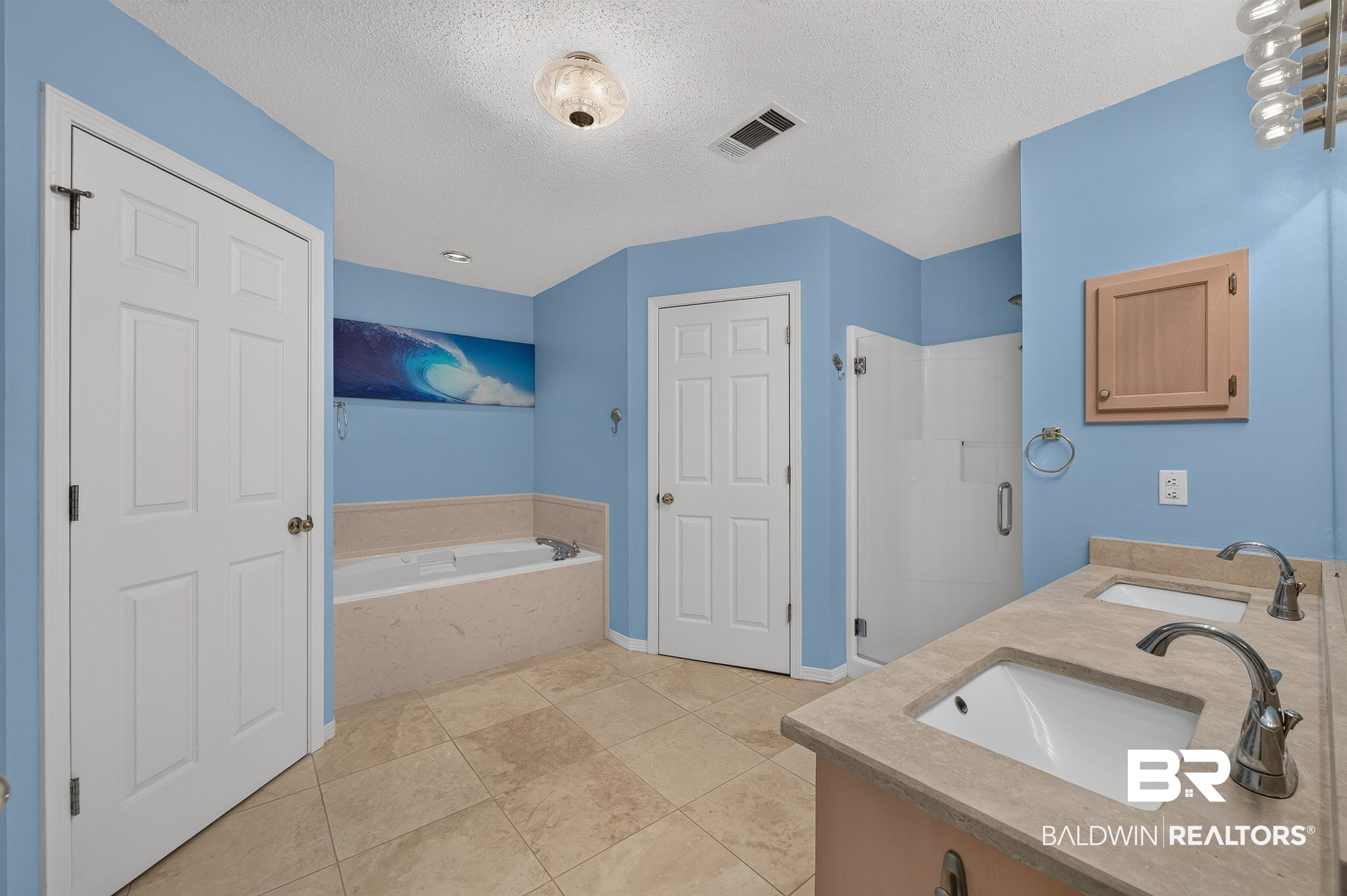 22685 County Road 12 Foley, AL 36535 - Photo 54 of 89 Bathroom featuring a dual vanity with undermount sinks, a walk-in shower with glass enclosure, a built-in soaking tub, and tile flooring