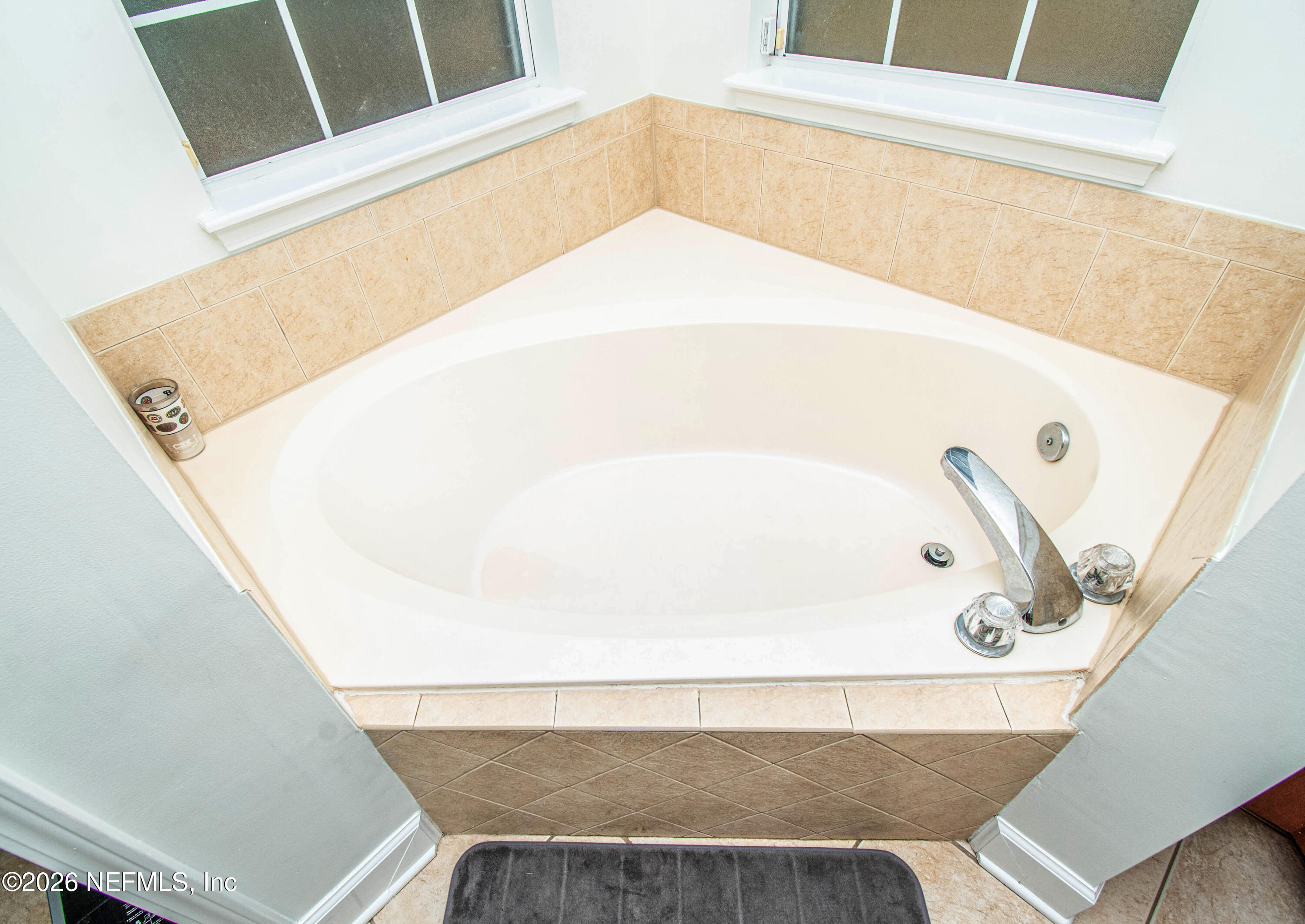 7733 Odis Yarborough Road Glen St. Mary, FL 32040 - Photo 27 of 45 a bathroom with a bathtub