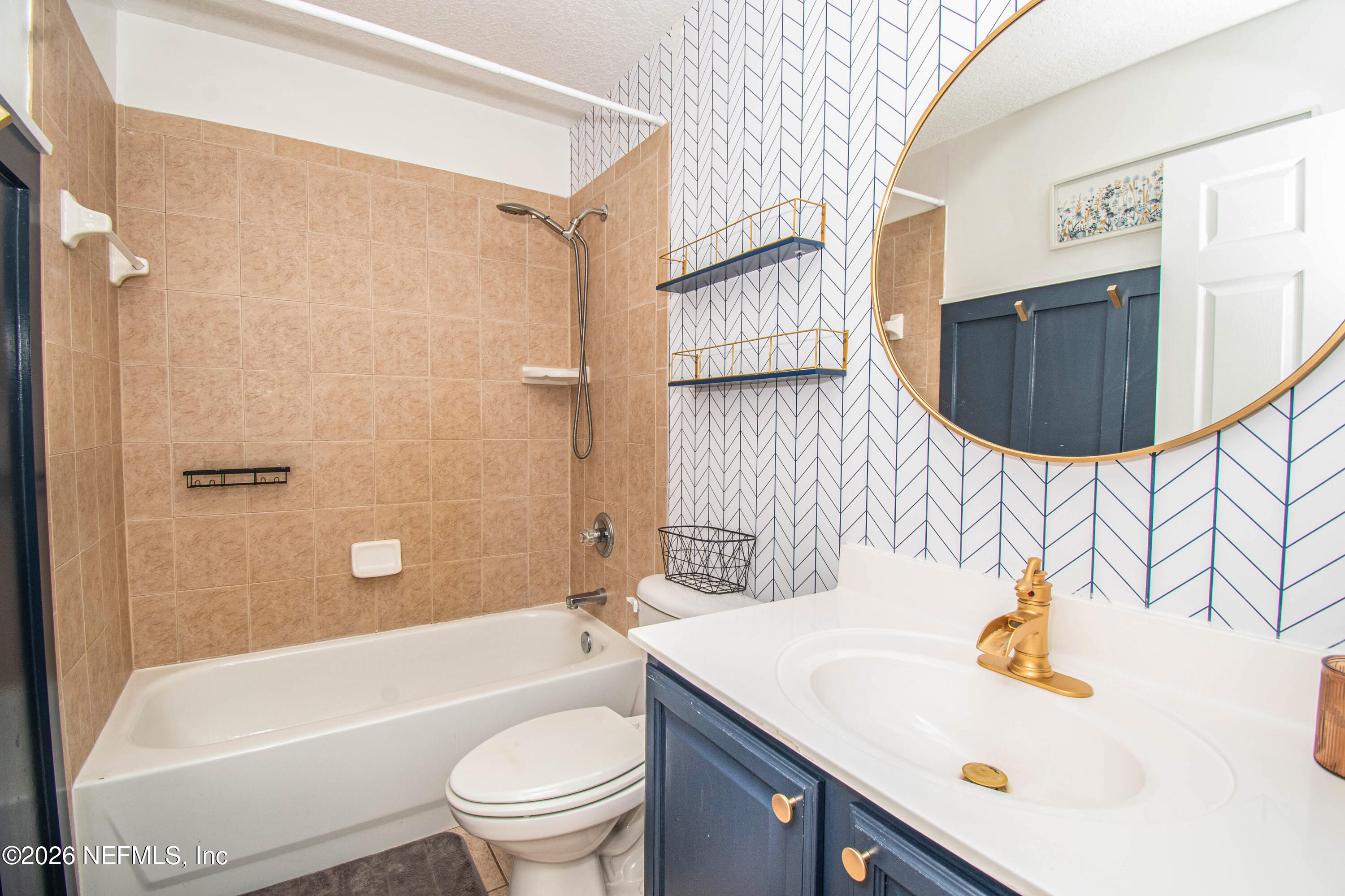 7733 Odis Yarborough Road Glen St. Mary, FL 32040 - Photo 33 of 45 a bathroom with a sink toilet and shower