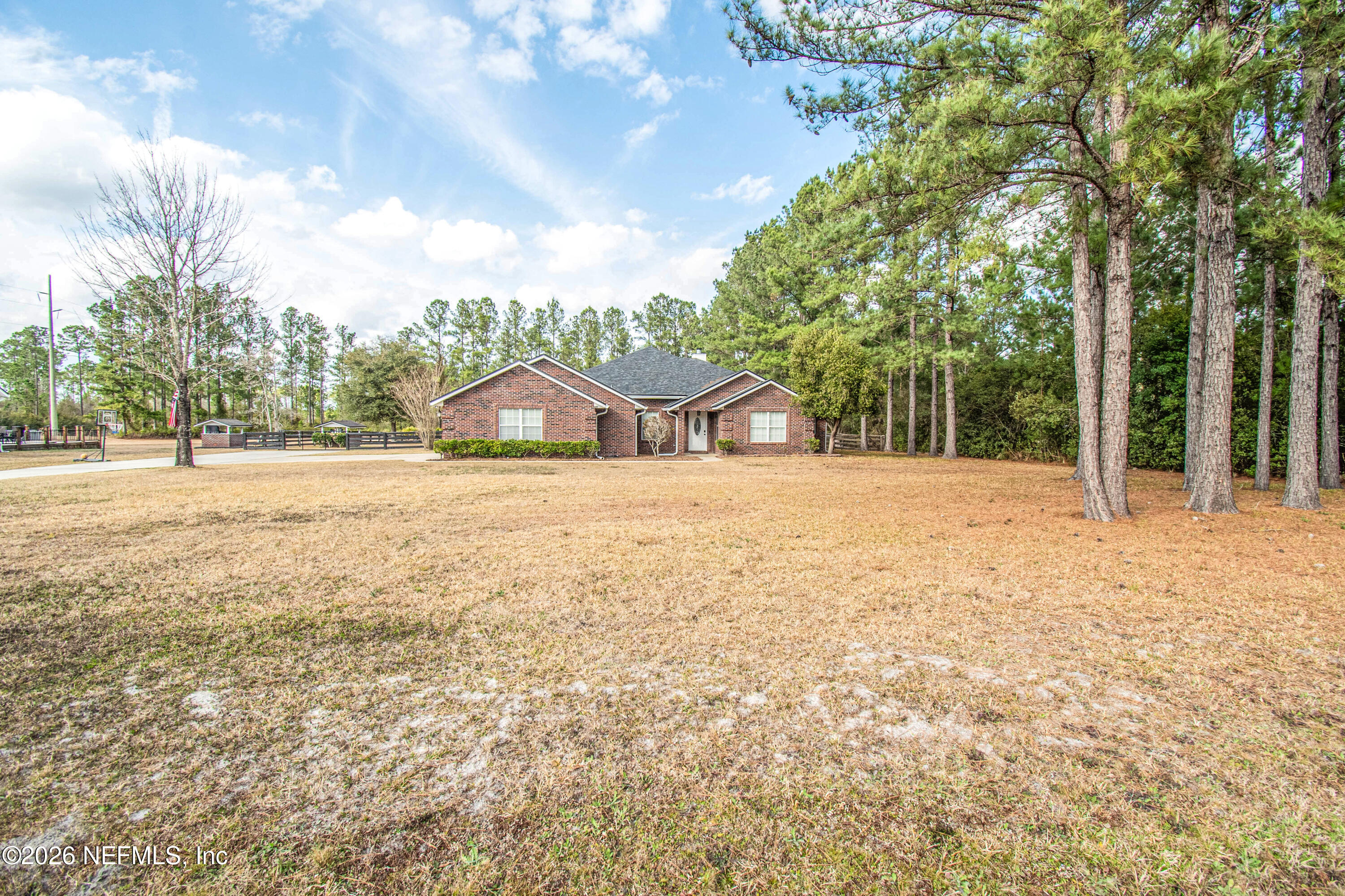 7733 Odis Yarborough Road Glen St. Mary, FL 32040 - Photo 4 of 45 a view of a house with a yard