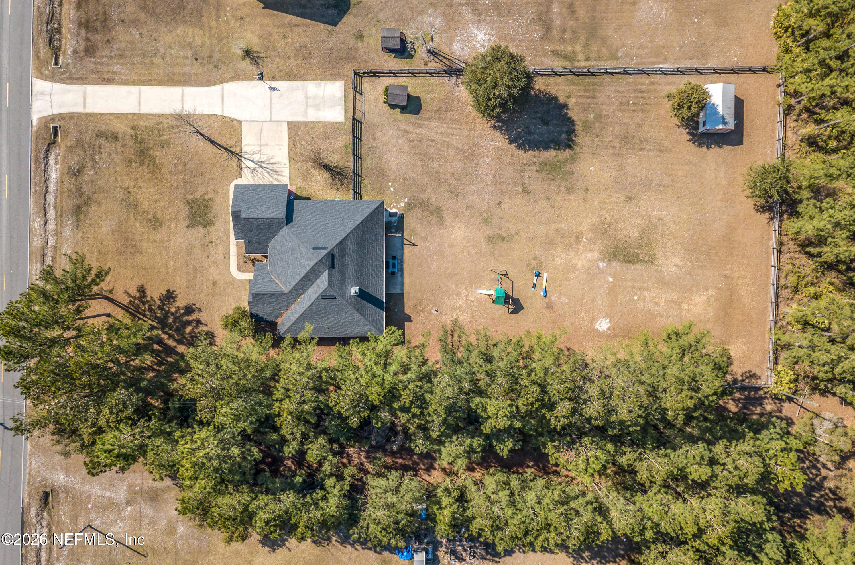 7733 Odis Yarborough Road Glen St. Mary, FL 32040 - Photo 43 of 45 an aerial view of residential house with outdoor space