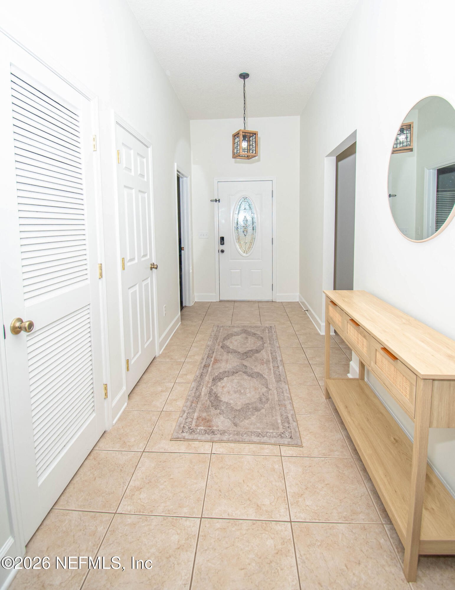 7733 Odis Yarborough Road Glen St. Mary, FL 32040 - Photo 6 of 45 a bathroom with a sink a mirror and a shower