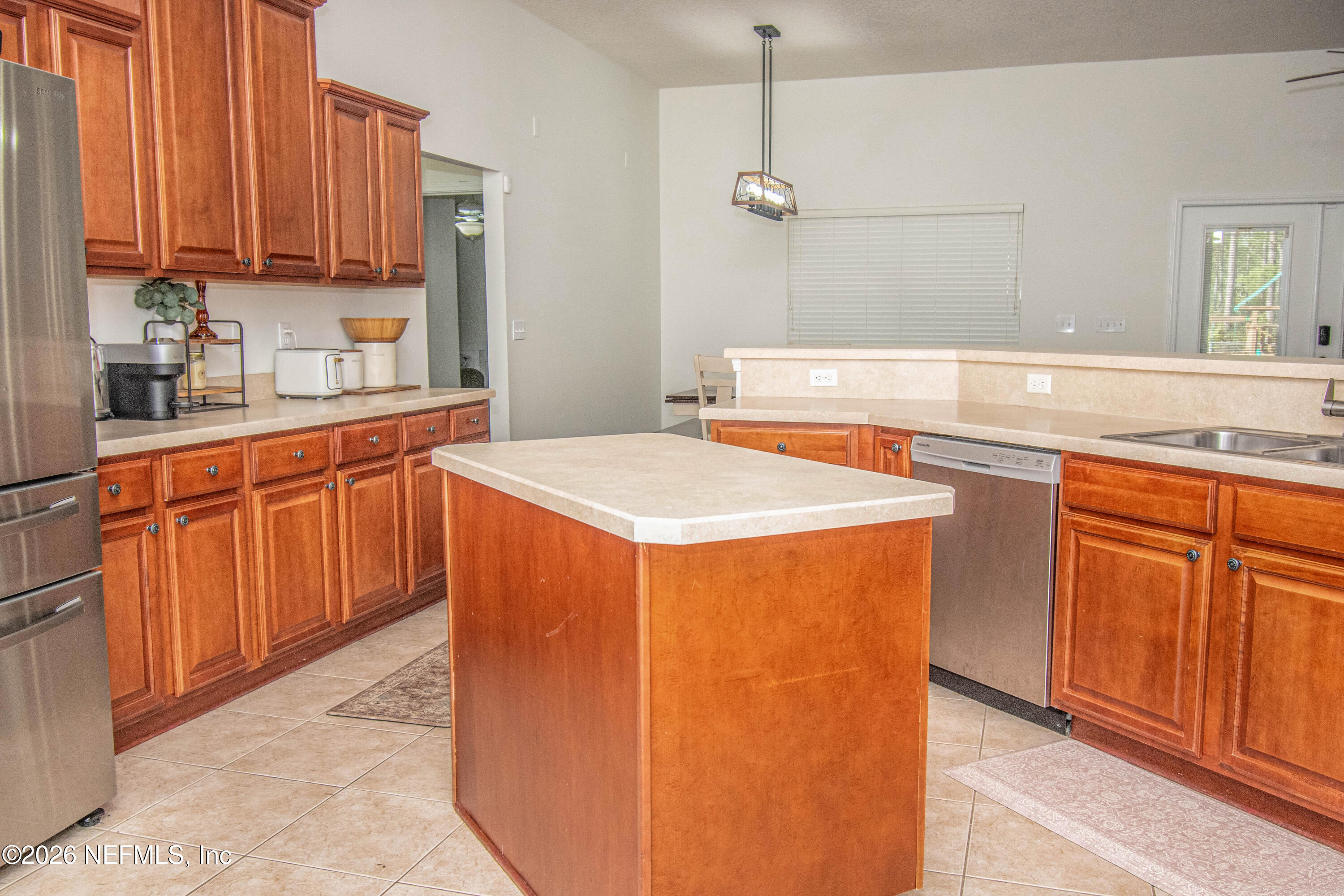 7733 Odis Yarborough Road Glen St. Mary, FL 32040 - Photo 8 of 45 a kitchen that has a sink and a stove in it