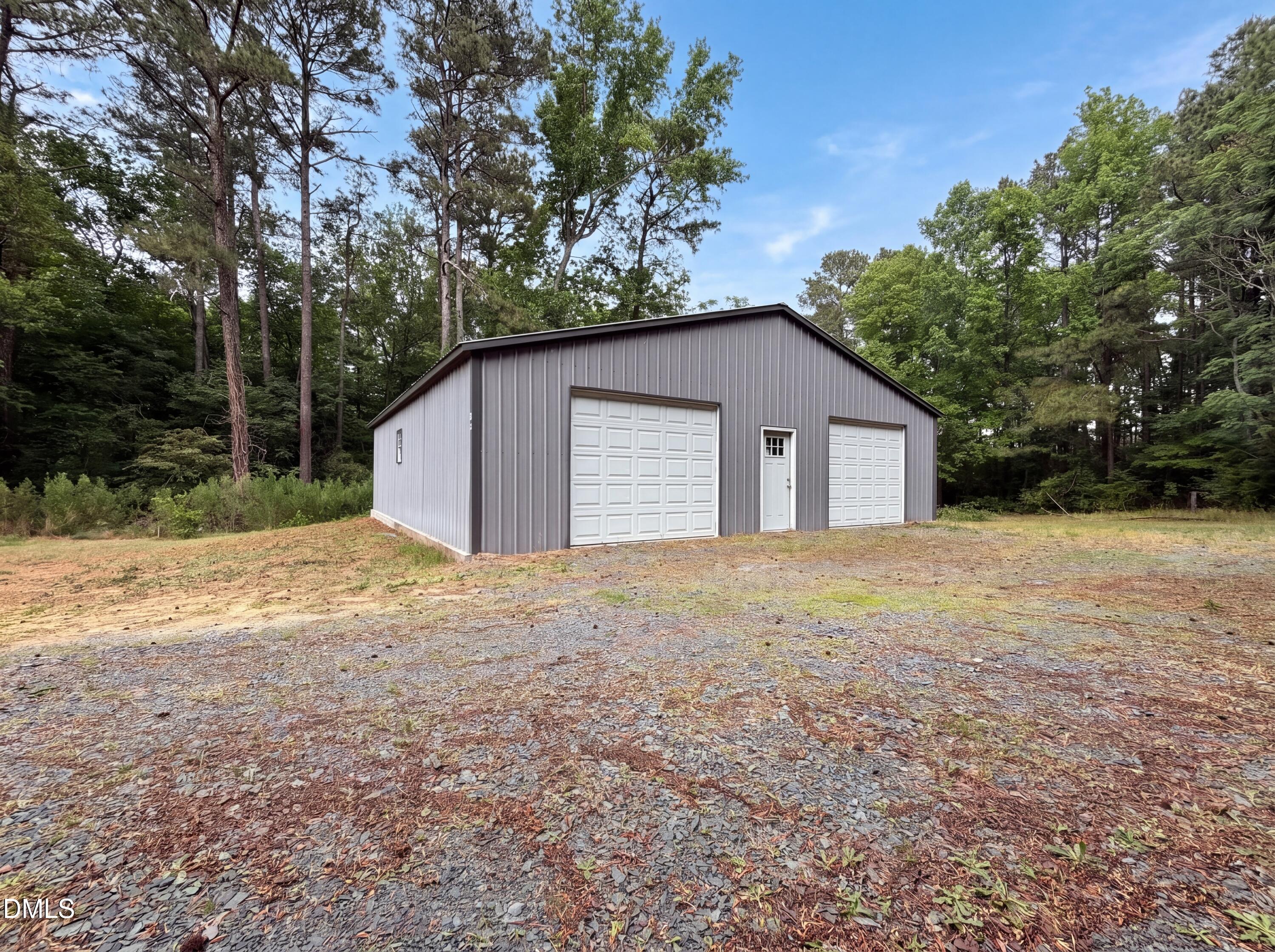 4894 Elevation Road, Unit C Benson, NC 27504 - Photo 22 of 24 a house with a yard