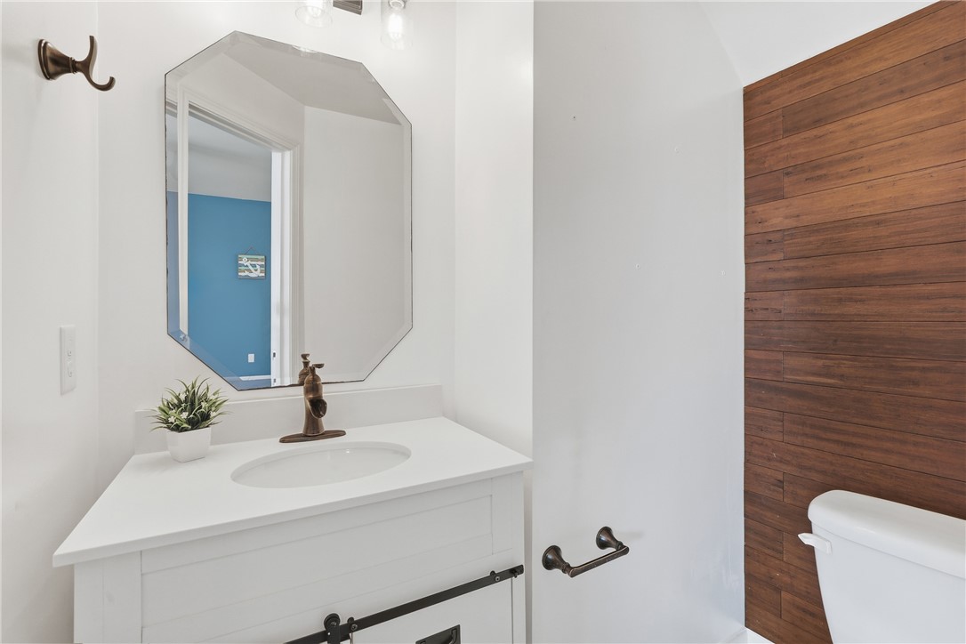 347 Riverdale Road Simpsonville, SC 29680 - Photo 9 of 30 This bathroom features a contemporary vanity with sleek hardware and a stylish mirror.