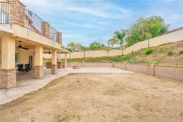 a view of a backyard of the house