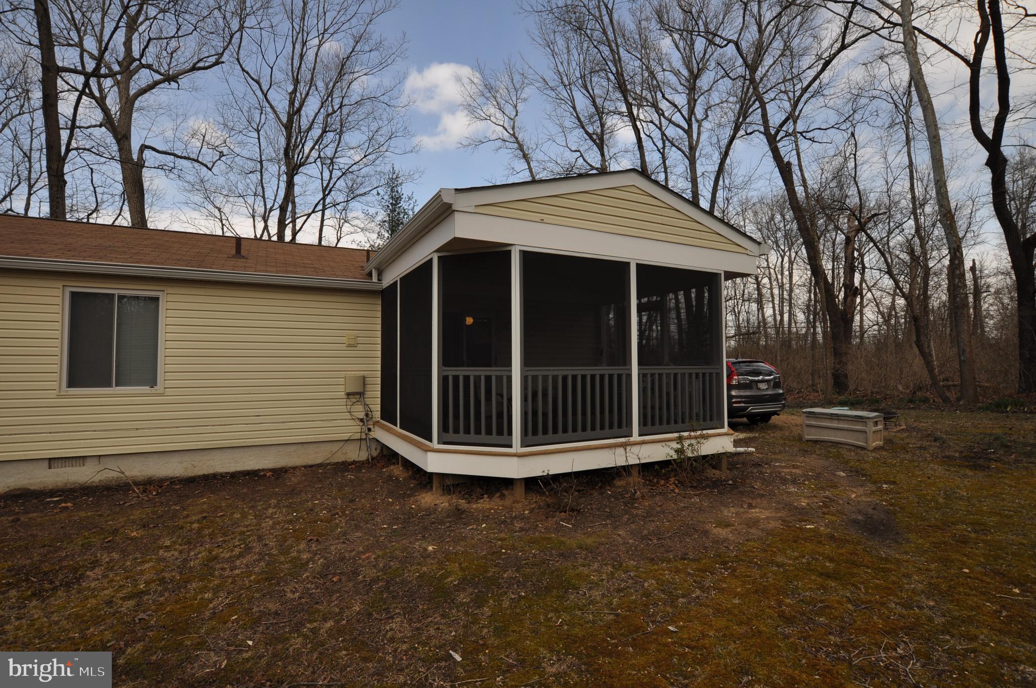 1401 Farmington Road East Accokeek, MD 20607 - Photo 14 of 34 Backyard near house