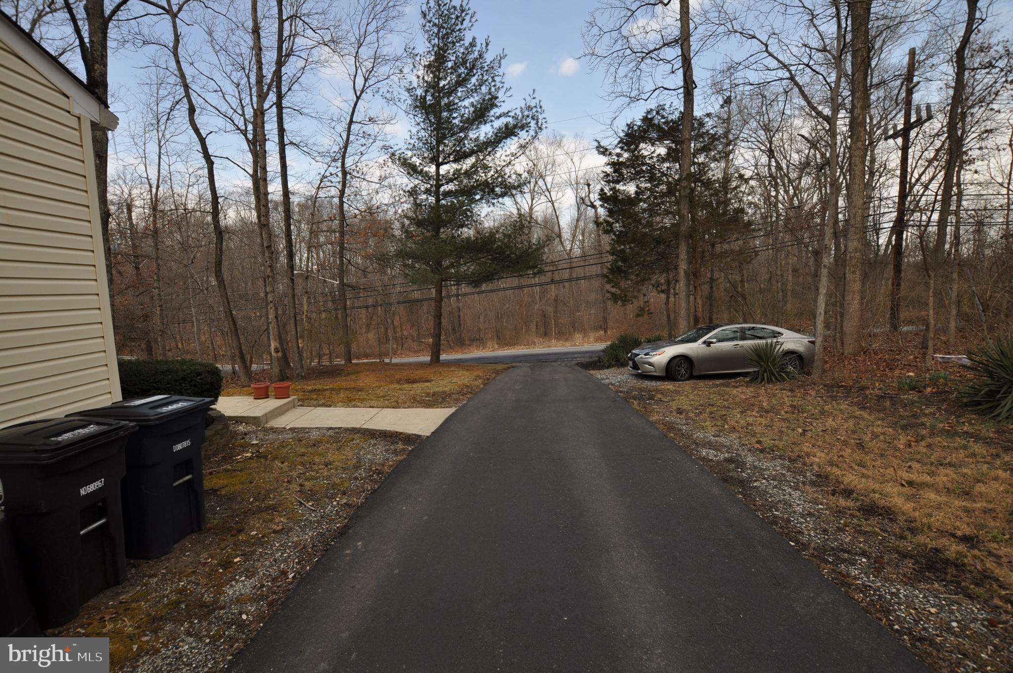 1401 Farmington Road East Accokeek, MD 20607 - Photo 20 of 34 Long paved driveway