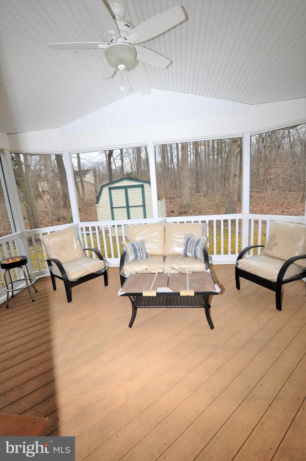 1401 Farmington Road East Accokeek, MD 20607 - Photo 28 of 34 Screened porch with cathedral ceilings