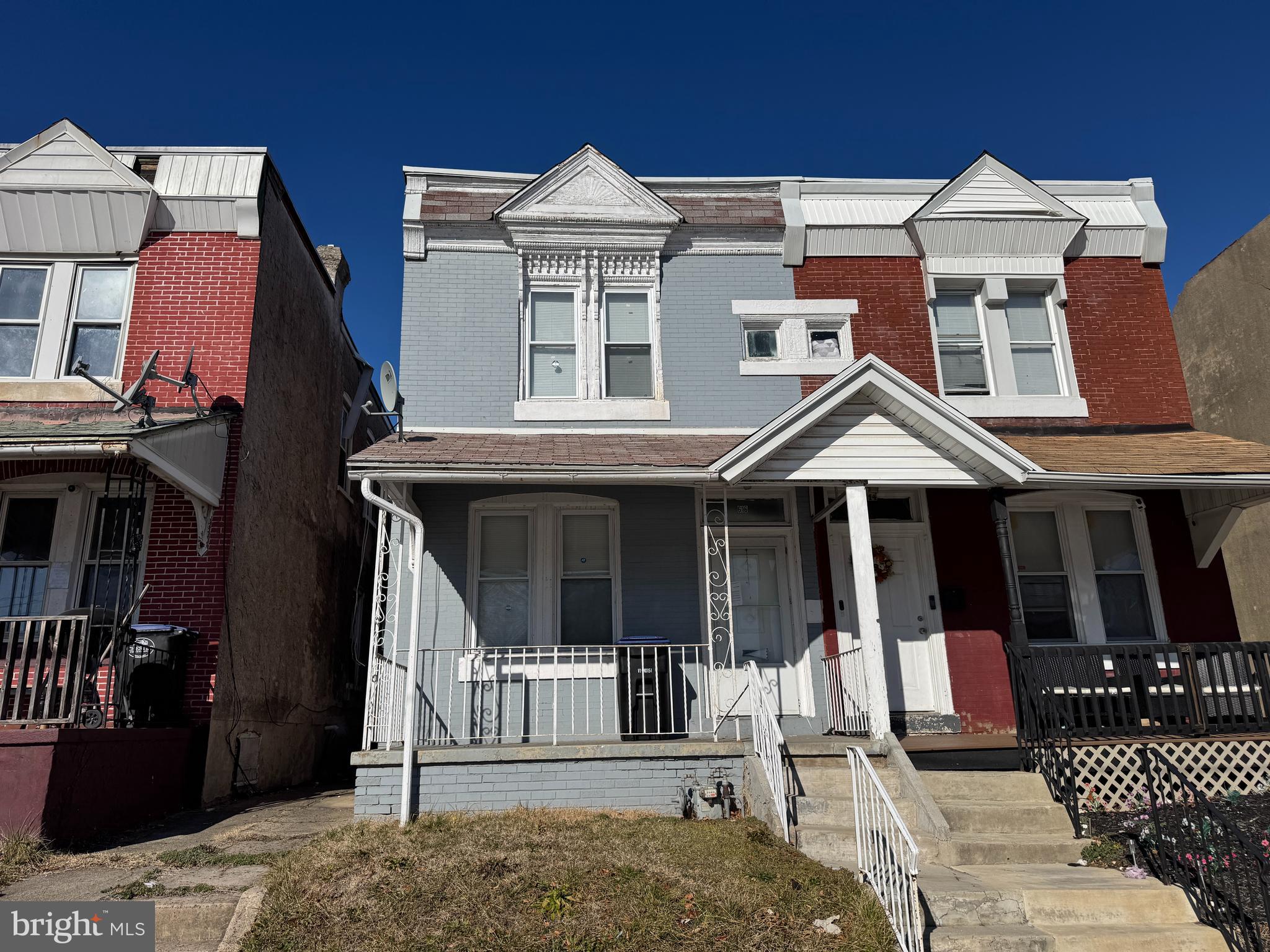 a front view of a house with a porch