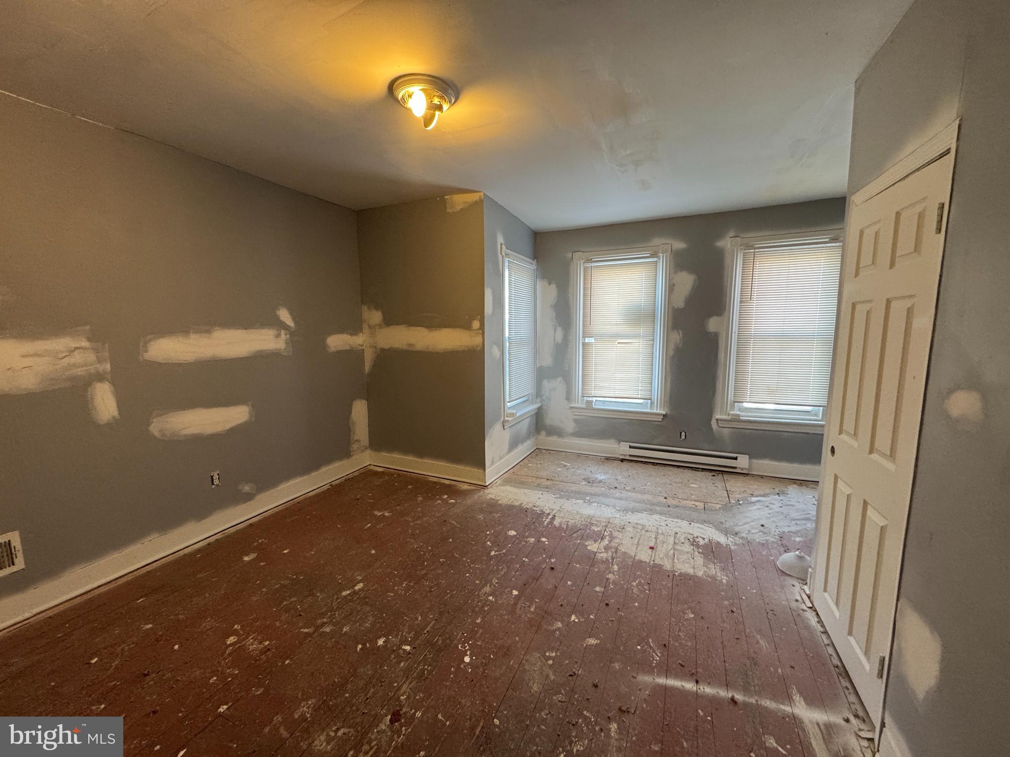 616 West 6th Street Chester, PA 19013 - Photo 11 of 15 a view of livingroom with window