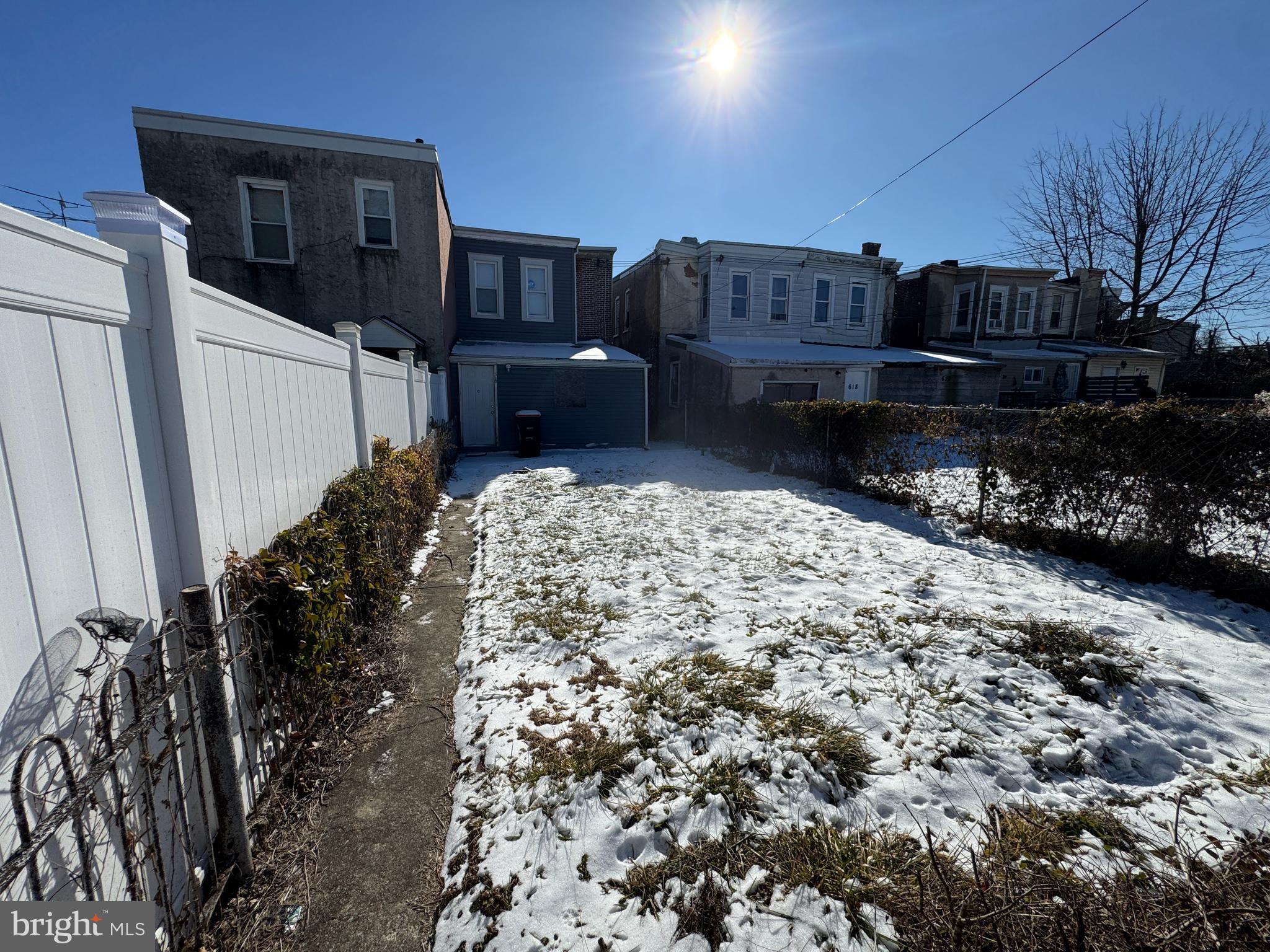 616 West 6th Street Chester, PA 19013 - Photo 3 of 15 a view of a house with wooden fence