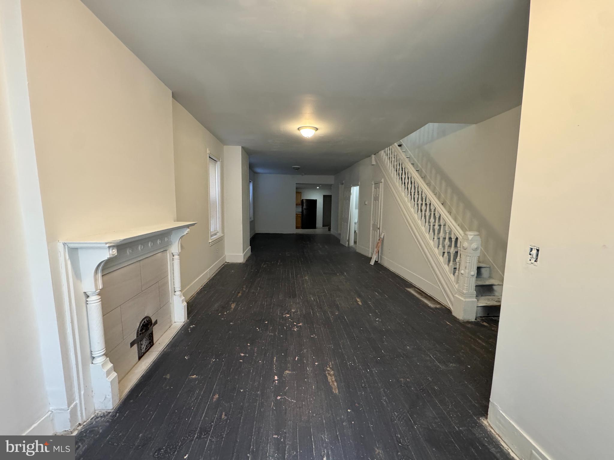 616 West 6th Street Chester, PA 19013 - Photo 5 of 15 a view of entryway with stairs and wooden floor