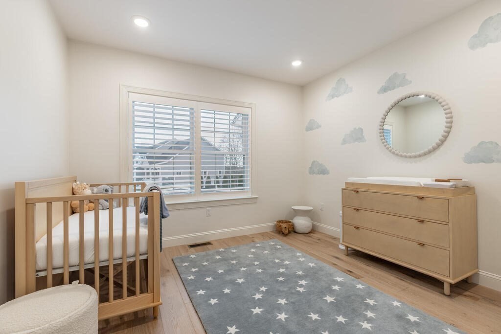 165 Cambridge Road, Unit 10 Woburn, MA 01801 - Photo 18 of 33 a spacious bathroom with a sink a toilet and a mirror