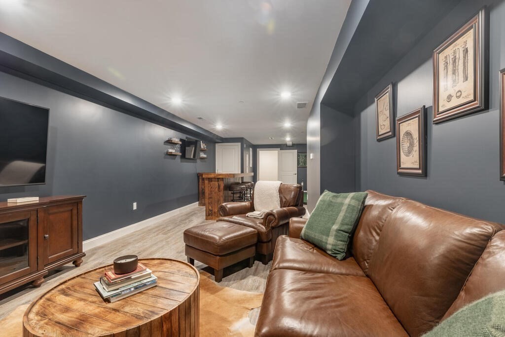 165 Cambridge Road, Unit 10 Woburn, MA 01801 - Photo 24 of 33 a living room with furniture