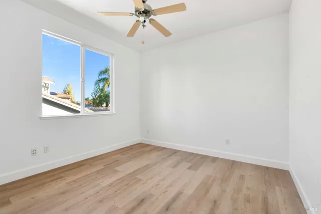 a view of a swimming pool with an outdoor seating