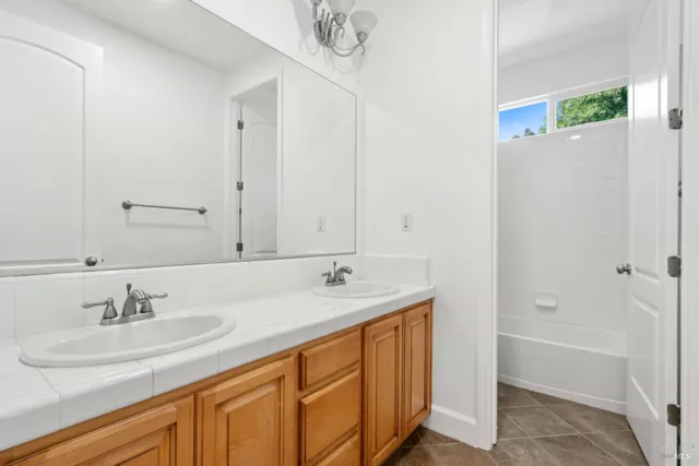 an aerial view of residential houses and outdoor space