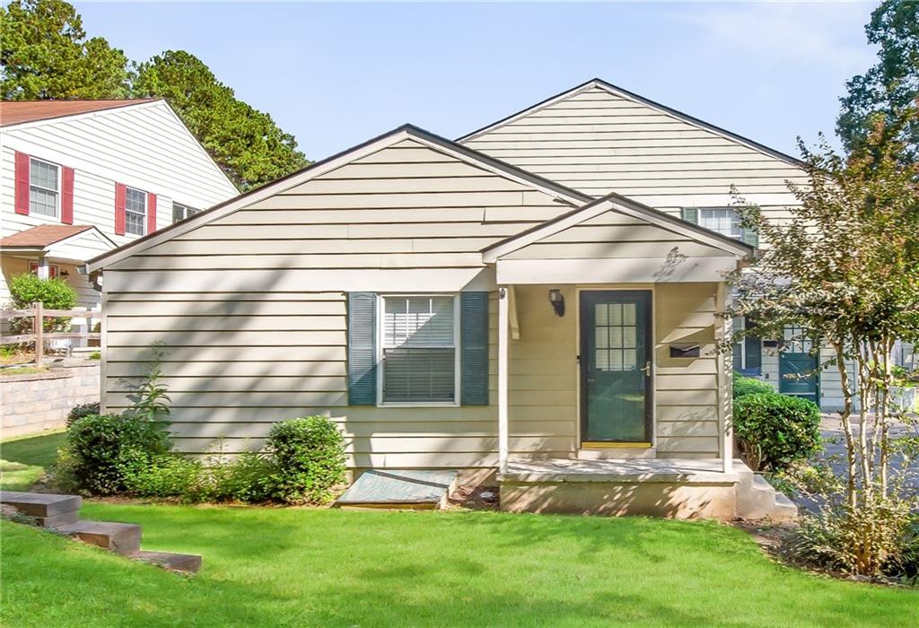 front view of a house and a yard