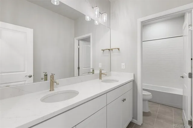 a bathroom with a shower and a toilet