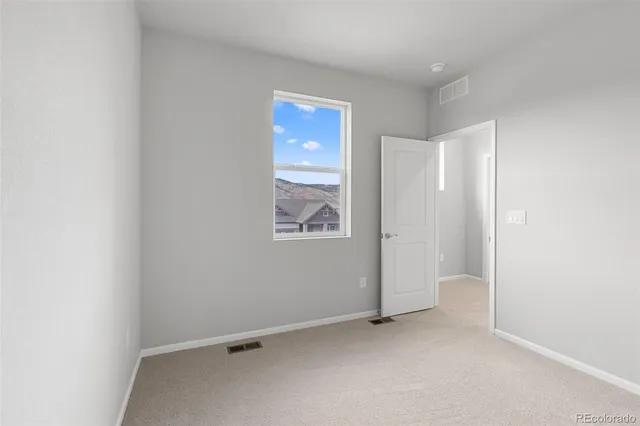 an empty room with a window