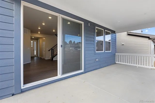 a view of a hallway with a room
