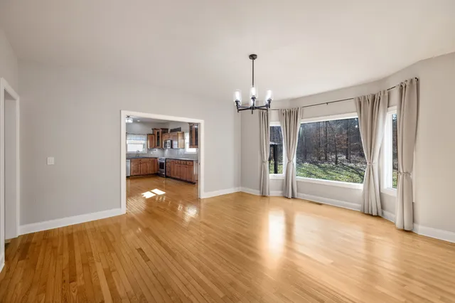 a view of livingroom with furniture and chandelier