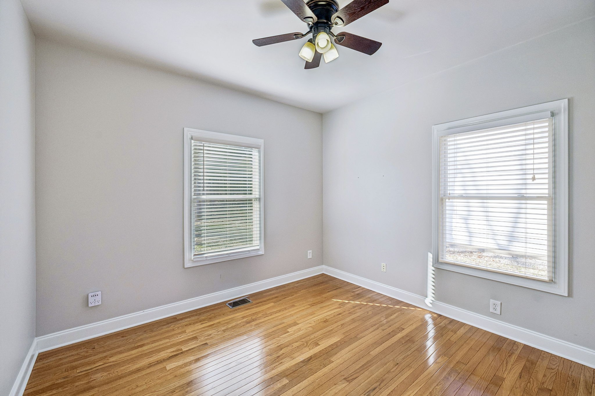 3840 East Compton Road Murfreesboro, TN 37130 - Photo 19 of 51 a view of an empty room with wooden floor and a window