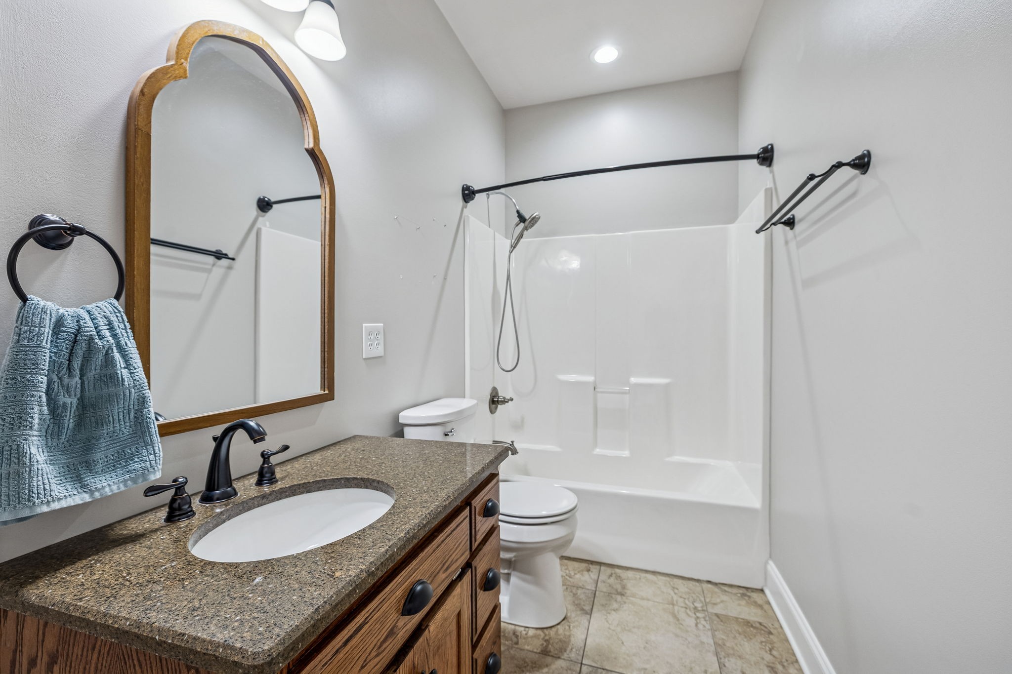 3840 East Compton Road Murfreesboro, TN 37130 - Photo 20 of 51 a bathroom with a granite countertop sink toilet and shower