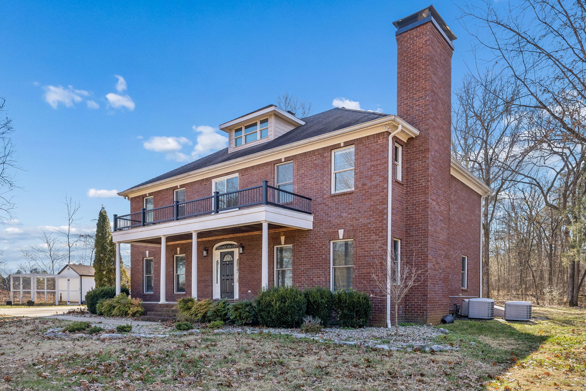 3840 East Compton Road Murfreesboro, TN 37130 - Photo 2 of 51 a front view of a house with garden