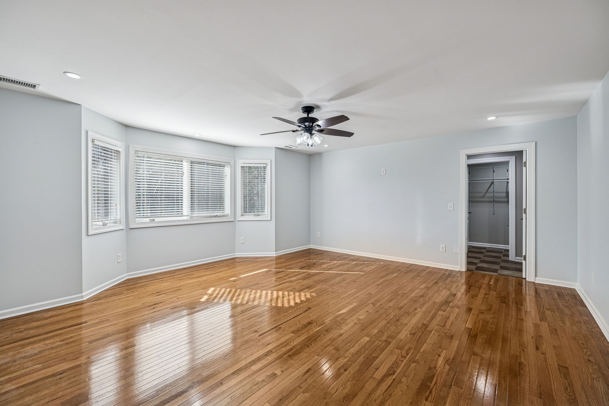3840 East Compton Road Murfreesboro, TN 37130 - Photo 21 of 51 a view of an empty room with a window and wooden floor