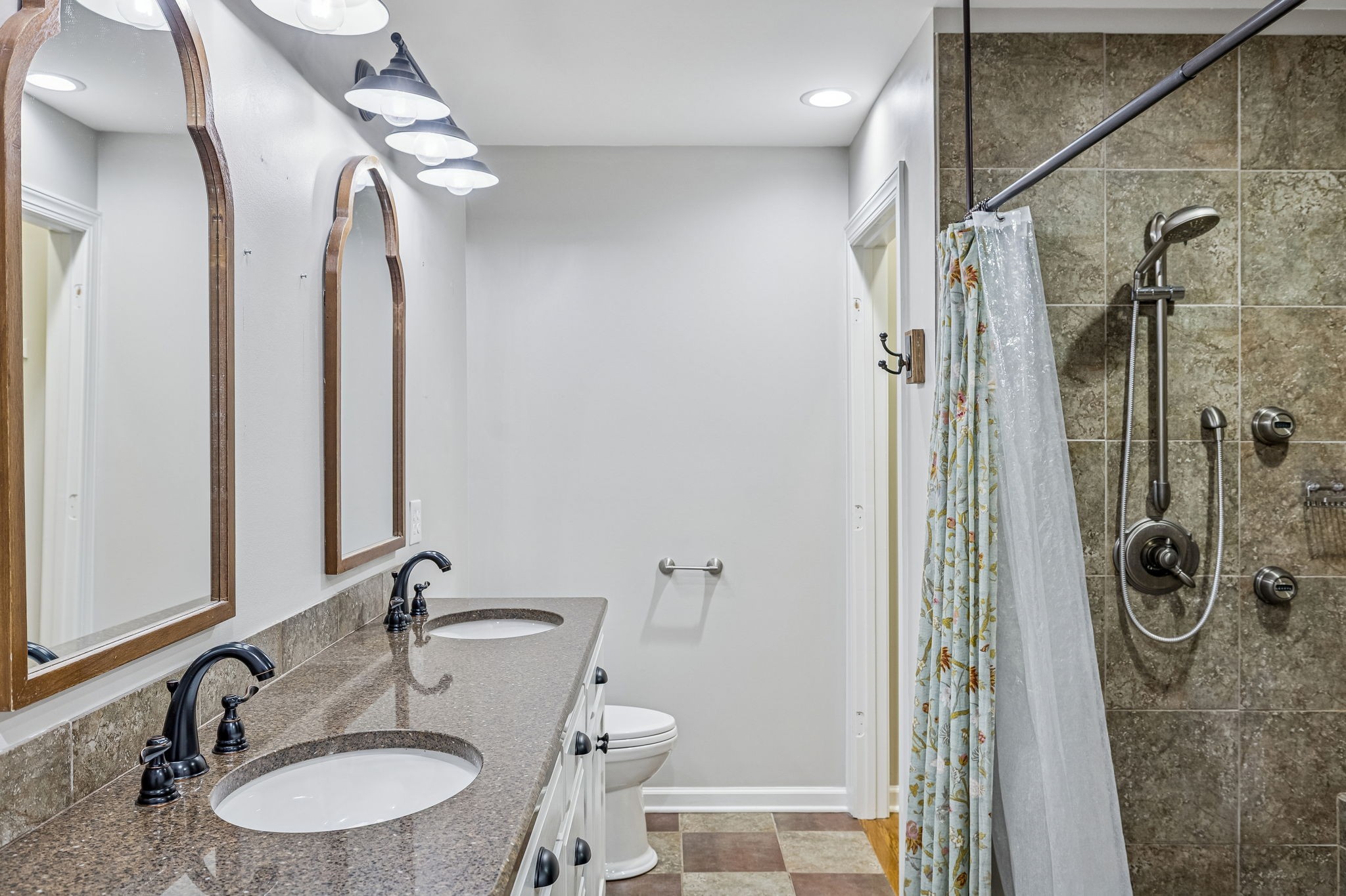 3840 East Compton Road Murfreesboro, TN 37130 - Photo 23 of 51 a bathroom with a granite countertop shower sink vanity and mirror