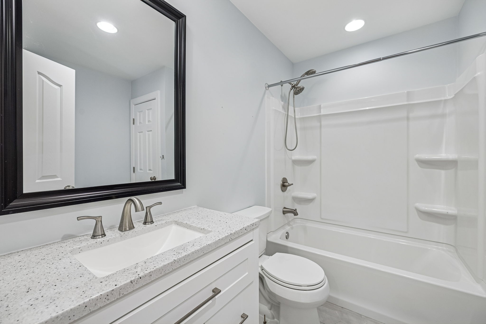 3840 East Compton Road Murfreesboro, TN 37130 - Photo 27 of 51 a bathroom with a granite countertop sink a toilet and shower