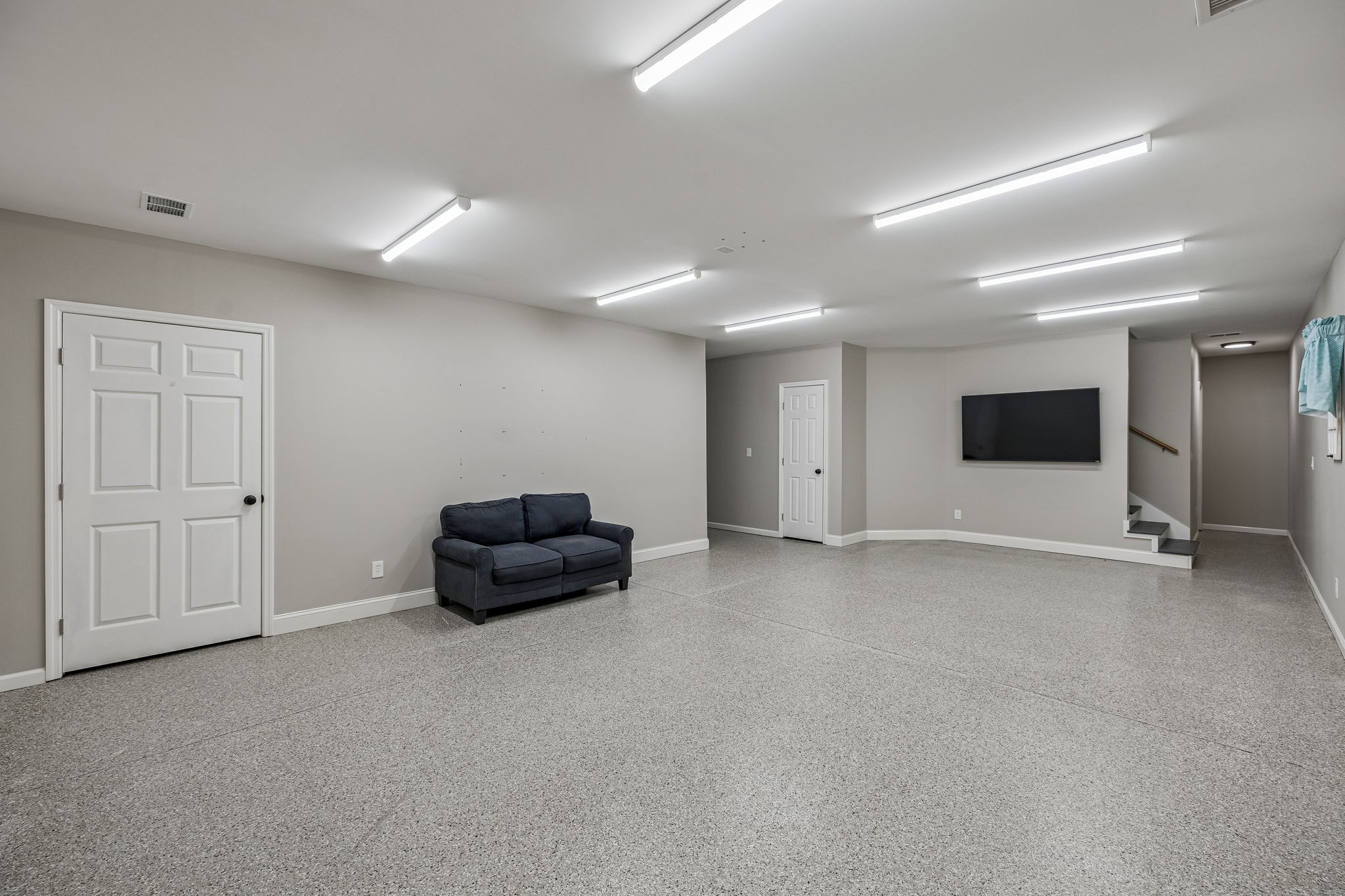 3840 East Compton Road Murfreesboro, TN 37130 - Photo 31 of 51 a living room with furniture and a flat screen tv