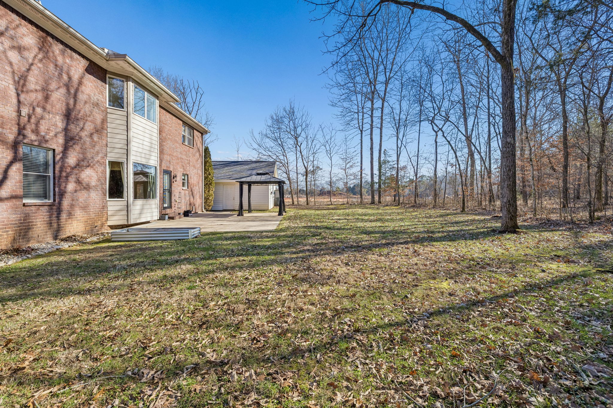 3840 East Compton Road Murfreesboro, TN 37130 - Photo 39 of 51 a backyard of a house with lots of green space